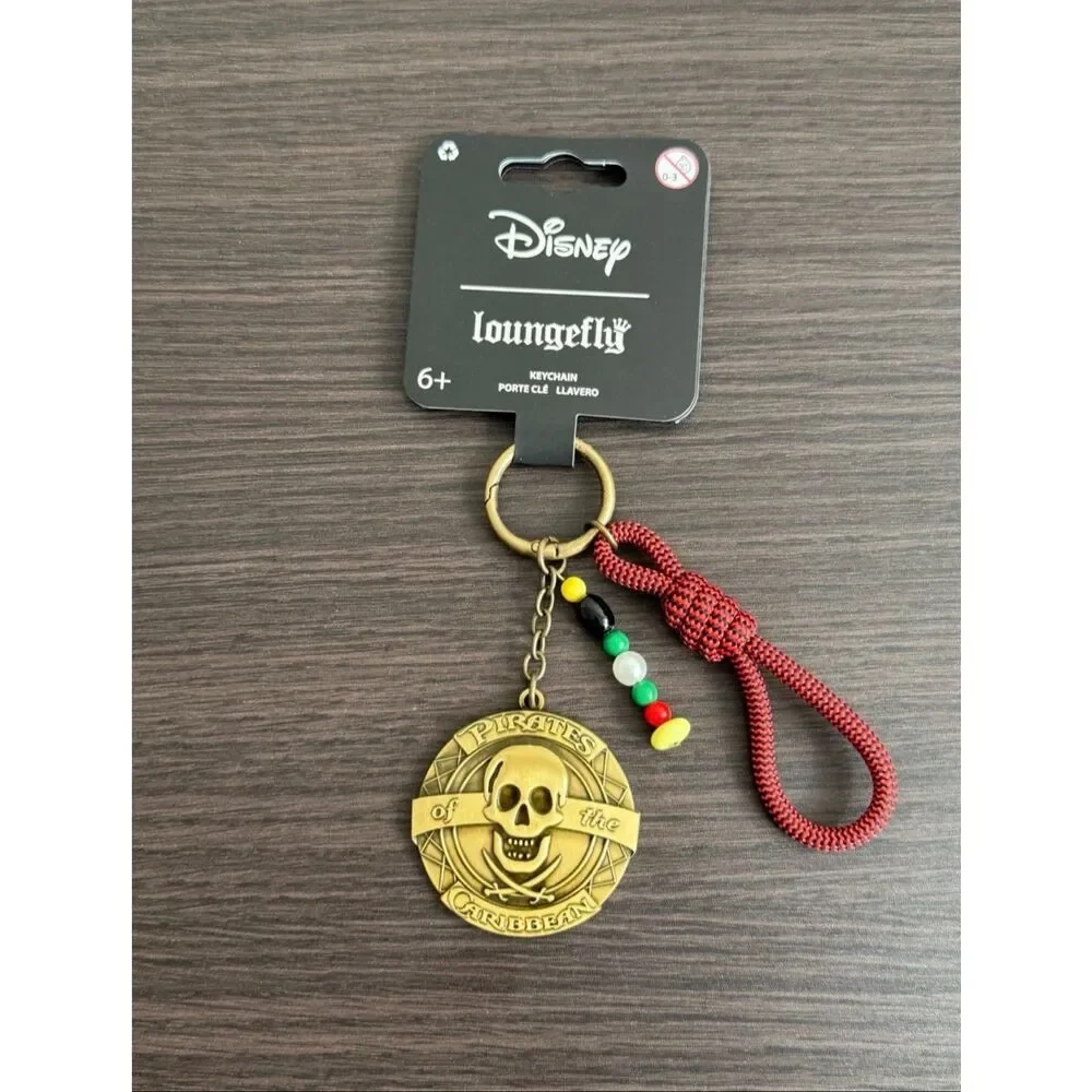 Loungefly Disney The Pirates of the Caribbean Medallion Multi-Charm Keychain